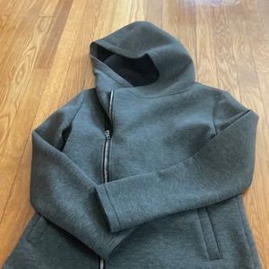 Grey hooded raincoat. give love get love for Betsy Johnson.